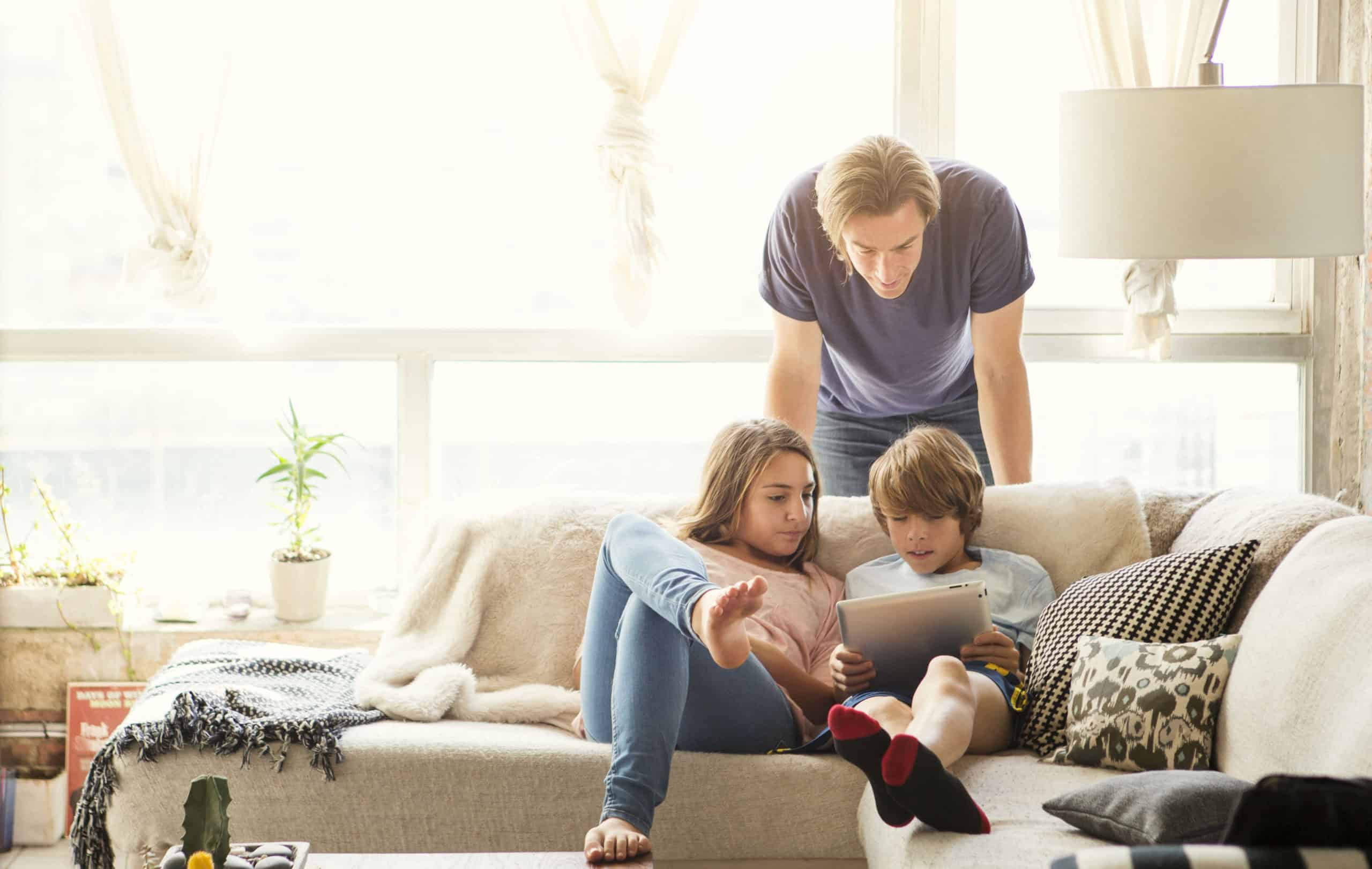 Family enjoying natural light at home | RC Solar & Roofing energy solutions for sustainable living